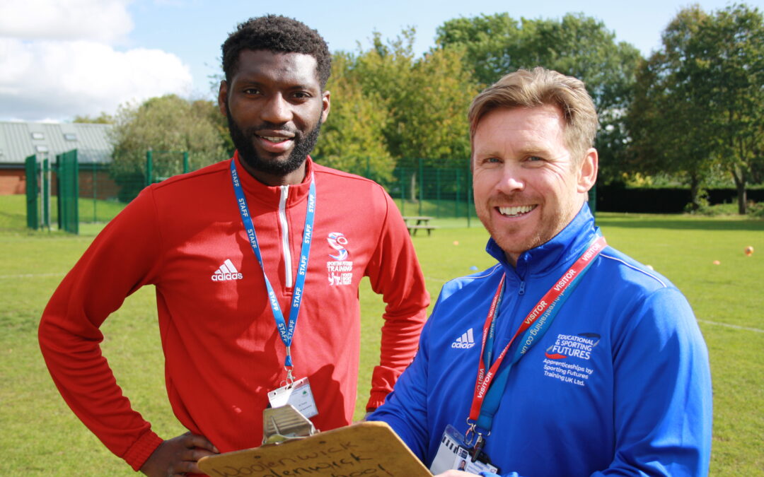 Image of a pair of ESF Trainers smiling in a field