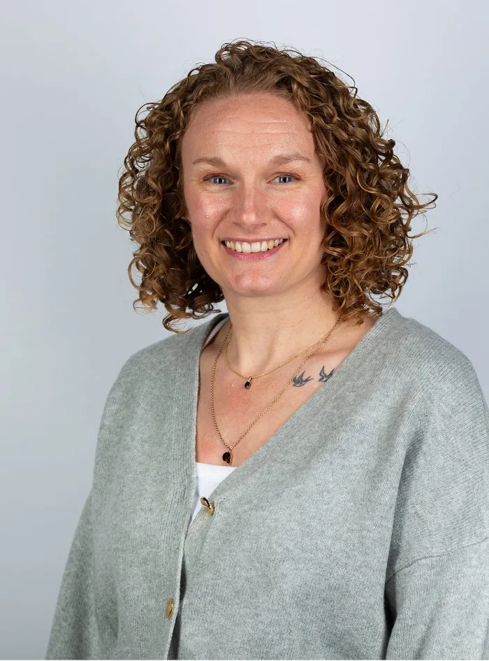 Kelly-Website-image A headshot of Kelly Rose