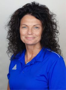 Kerry Updated background a headshot of Kerry