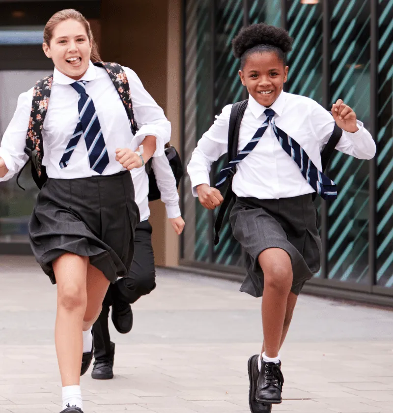 a group of secondary pupils running