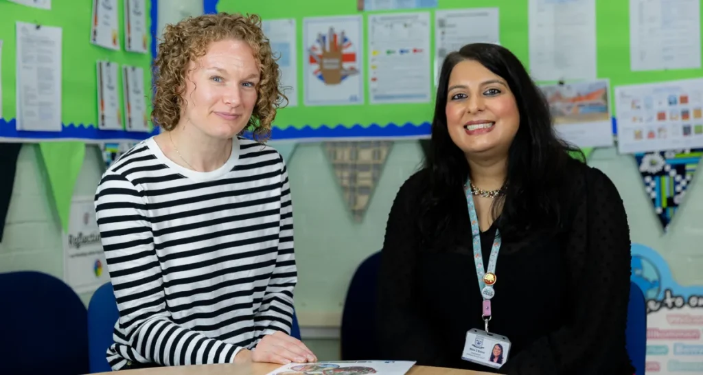An ESF Apprenticeship leader sits next to a headteacher